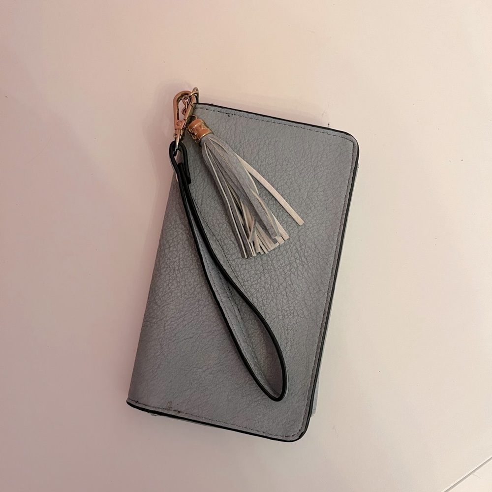 Baby Robin egg blue wristlet wallet with tassel and gold accents